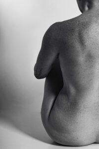 Purple Moose Portraits black and white boudoir simple nude close up of a womans back